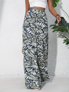 Women's summer wide-leg pants featuring a tropical leaf print for a casual boho look.