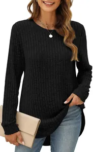 Detailed view of women's black ribbed knit long sleeve top with curved high-low hem
