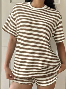 Detail showing the brown and white striped knit texture of this casual summer set