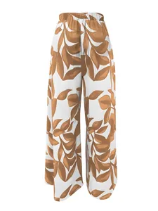Elegantes pantalones de pierna ancha para mujer con estampado de hojas marrones