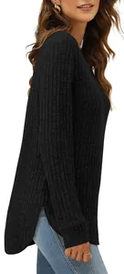 Close-up side view of women's black ribbed long sleeve top featuring a high-low curved hem