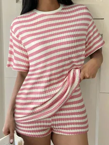 Detail of pink and white striped waffle knit t-shirt and shorts lounge set for women