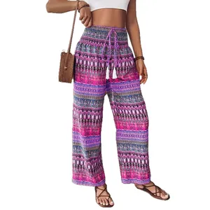 Pantalon bohème élégant à imprimé floral, taille haute avec cordon à glands chic