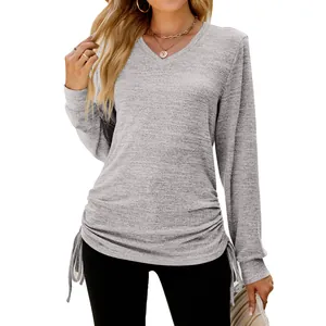 Detailed view of grey V-neck long sleeve T-shirt with side drawstring ruching details.