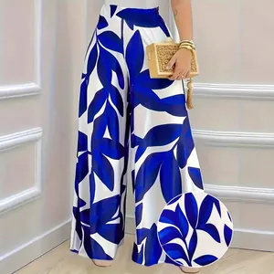 Elegante broek met hoge taille en wijde pijpen met een blauw-witte bladprint