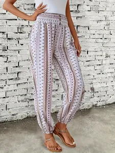 Detail of Bohemian ethnic print loose joggers with elastic waist and cuffed ankles
