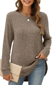 Detail of women's loose round neck long sleeve ribbed knit top with high-low hem