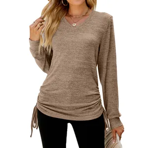 Close-up of women's casual brown V-neck long sleeve T-shirt with side drawstrings.