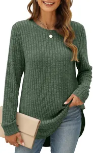 Close-up of green ribbed long sleeve top with elegant round neck and high-low hemline