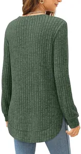Detail view of women's stylish green ribbed knit top with high-low curved hem back