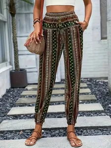 Pantalones bombachos boho con estampado étnico, cintura elástica y puños en exteriores