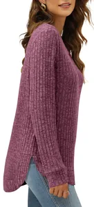 Detail shot of women's purple ribbed top with high-low curved hem and side slits.