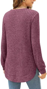 Back view of a mauve ribbed long-sleeve top with a high-low curved hem for women.