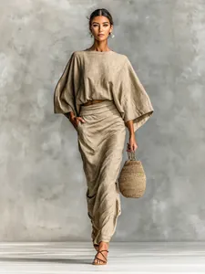 Full view of a minimalist linen-look two-piece skirt set with loose top and high waist