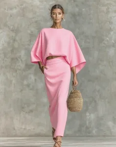 Elegant pink high-waisted skirt set with loose long-sleeved top for autumn commute