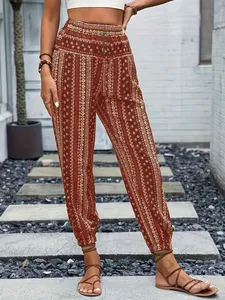 Pantalones jogger bohemios con estampado étnico, cintura elástica alta y botones