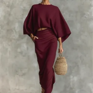 Elegant wine red two-piece set with batwing sleeve top and high-waisted maxi skirt