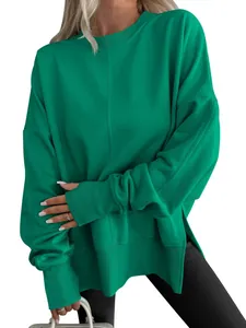 Loose green crew neck sweatshirt with batwing sleeves and side slits