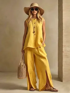Full view of women's sleeveless yellow cotton linen two-piece set with wide-leg pants