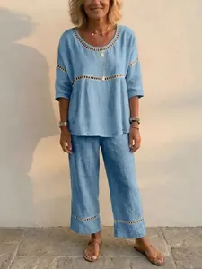 Comfortable blue two-piece linen-style set for women with delicate hollow lace details