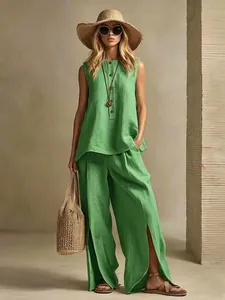 Stylish green cotton linen two-piece set with sleeveless top and slit wide-leg pants