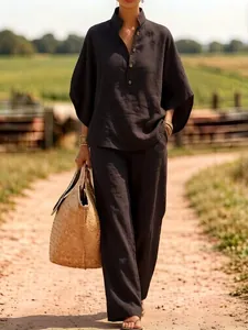 Casual linnen tweedelige set met overhemd met knopen en broek met wijde pijpen bruin