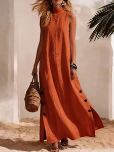Side slit sleeveless maxi dress in burnt orange cotton linen with button details