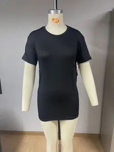 Detail view of a black tactical T-shirt on a mannequin showing the hidden side holster pocket