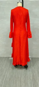 Detailed back view of orange Bohemian long sleeve maxi dress with ruffled hem and cuffs