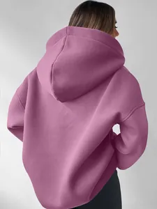 Back view detail of a premium purple oversized hoodie with a large hood for women