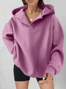 Close-up of a women's oversized lilac hooded sweatshirt with unique collar detail