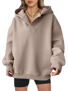 Oversized women's khaki hooded sweatshirt with unique polo collar and ribbed cuffs.