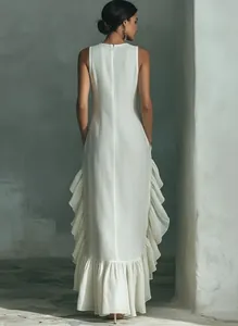 Back view of elegant white sleeveless dress with dramatic ruffle hem detail