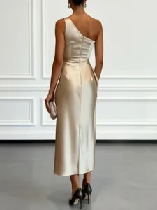 Detailed back view of an elegant champagne satin one-shoulder evening party midi dress