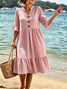 Pink bohemian V-neck polka dot dress with ruffle sleeves and tiered hem for summer vacation