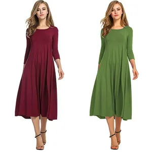 Élégante robe longue évasée à manches longues et plissée de couleur unie pour l'automne