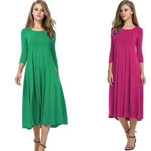 Élégante robe longue évasée à manches longues en vert et magenta pour l'automne