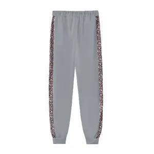 Pantaloni jogger grigi da donna con pannelli laterali leopardati e vita elastica