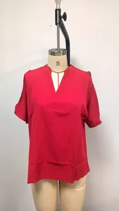 Elegant red V-neck summer blouse featuring stylish cold shoulder cut-out details on a mannequin.