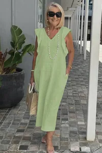 Summer light green V-neck flutter sleeve cotton linen maxi dress on an elderly model