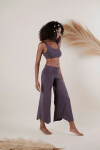 Mauve boho yoga set featuring a sports bra and high-waist irregular hem wide-leg pants