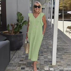 Elegant light green cotton linen summer dress with fly sleeves and V-neck for women