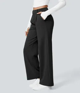 Side view detail of women's high-waisted black wide-leg dress pants with pockets