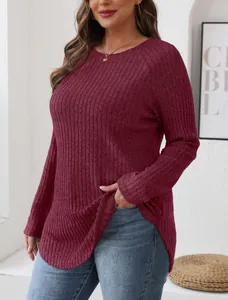 Women's plus size burgundy long sleeve ribbed knit top with stylish high-low curved hem