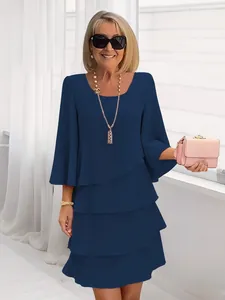 Elegant navy blue tiered cake dress for women with round neck and short sleeves.