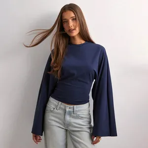 Navy blue long-sleeve top featuring wide flared sleeves and a slim waist design