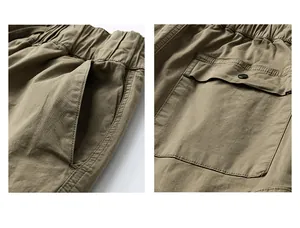 Close-up of cotton cargo shorts showing side pocket and buttoned back pocket detail.