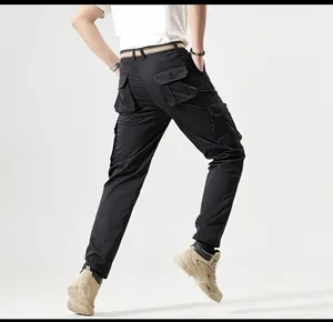 Back view of black multi-pocket cargo pants showing functional pocket details
