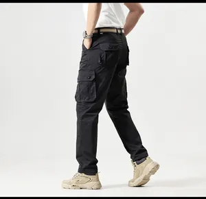 Detailed side view of durable black multi-pocket cargo pants for men in outdoor style