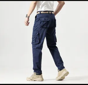 Detailed back view of men's dark blue mountain style cargo pants with multi-pockets